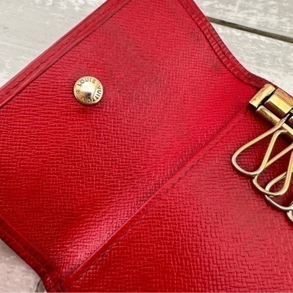 AUTHENTIC Louis Vuitton key holder. Previously owned. Color: Castilian red. - Picture 4 of 16
